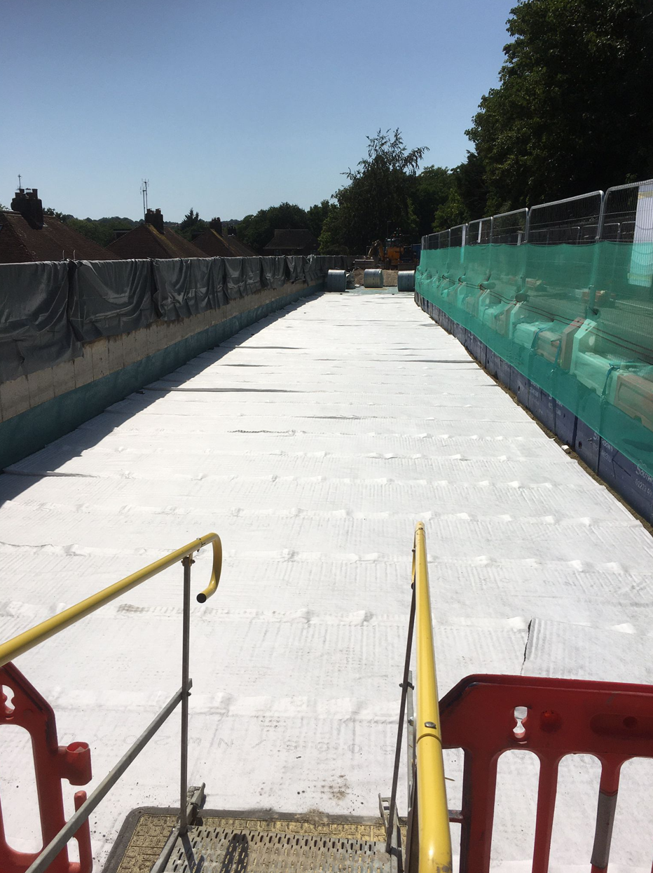 Installation of Deck Drain membrane system above the waterproofing